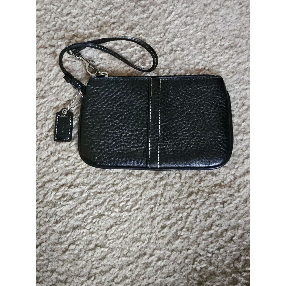 Coach pebbled black leather change purse
